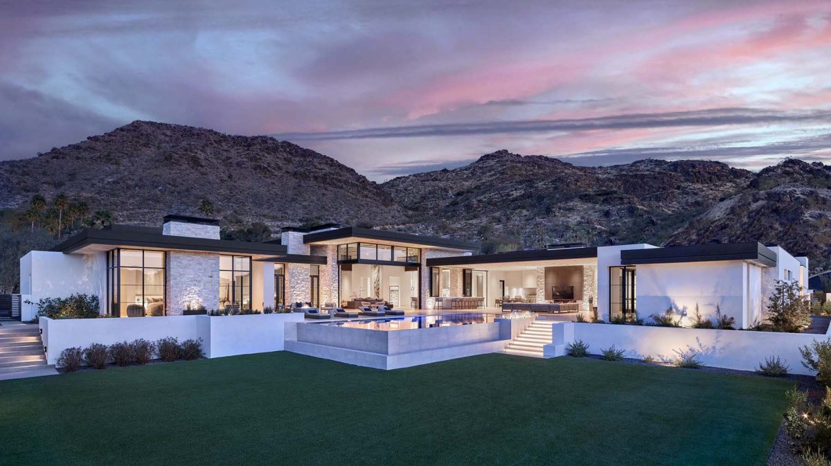 Completed luxury desert residence photographed at dusk after project closeout